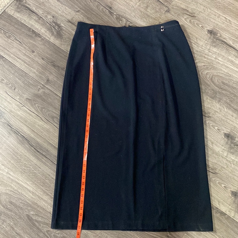 Black long skirt with split in the front.